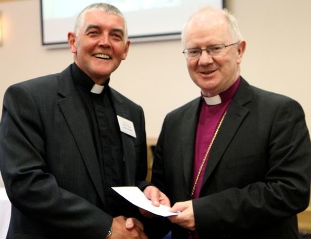 St Werburgh’s Church, Dublin, received a highly commended award in the social media category of the Church of Ireland Communications Competition, the results of which were announced at General Synod in Armagh. Pictured is Archdeacon David Pierpoint accepting his award from the Archbishop of Armagh, the Most Revd Dr Richard Clarke. 