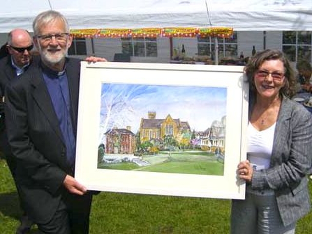 Canon Ben Neill and his wife Kay were presented with a painting of the rectory, church and school in Dalkey at a special picnic laid on in honour of his retirement in the church grounds.