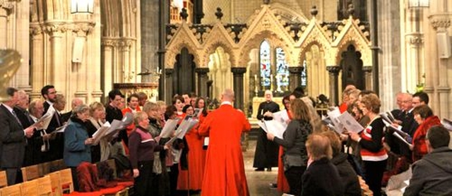 Ian Keatley directs the cathedral and parish choirs during Evensong in Christ Church Cathedral on the Feast of Christ the King. 