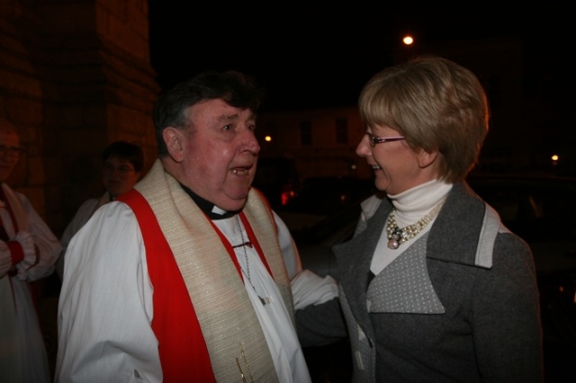 The former Archbishop of Dublin, the Rt Revd Walton Empey has a chat with the Minister for Social and Family Affairs, Mary Hanafin TD at the institution of the Revd Canon Patrick Lawrence as new Rector of Monkstown.