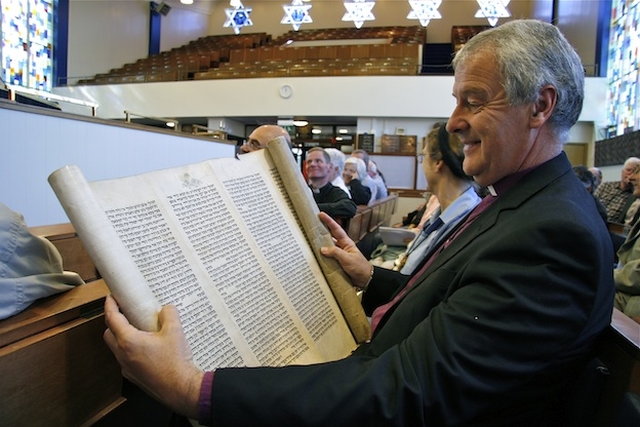 Rt Revd Michael Jackson viewing a  Hebrew Scroll at the Orthodox Synagogue, Terenure.