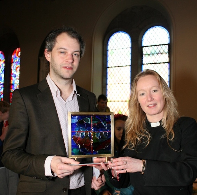 David Bremner, receiving an award for his work as organist at Sandford Parish, pictured with Revd Sonia Gyles. Photo: David Wynne