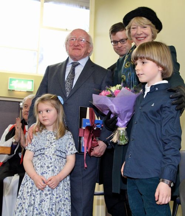 The President and Mrs Higgins were presented with gifts by two younger members of the parish of Holy Trinity, Killiney, at the official opening of the refurbished parish centre, the Carry Centre. 