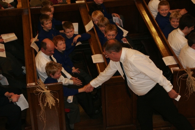 The Revd Terry Hurst wishes a young Boys' Brigade member a happy birthday.
