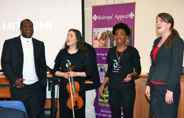 Archdeacon of Swaziland, Bheki Magongo, Roisin Dexter and Esosa Ighadaro of the Discovery Gospel Choir and Lydia Monds, education advisor with Bishop’s Appeal, sing together at the launch of the Bishop’s Appeal ‘Educate For Life’ campaign.  