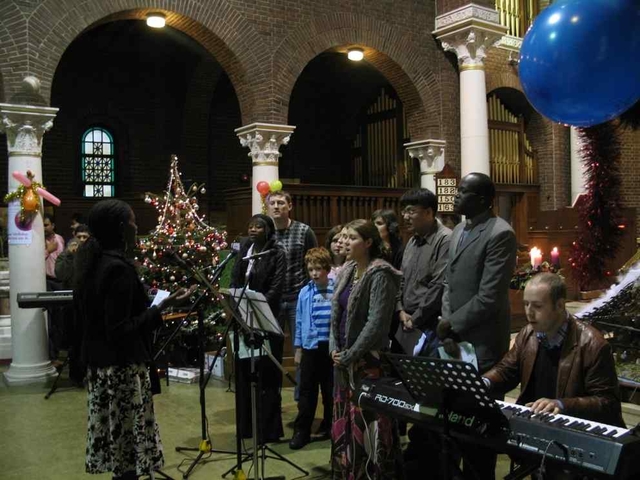 The Discovery Gospel Choir singing at the International Carol Service in St George’s and St Thomas’ Church.