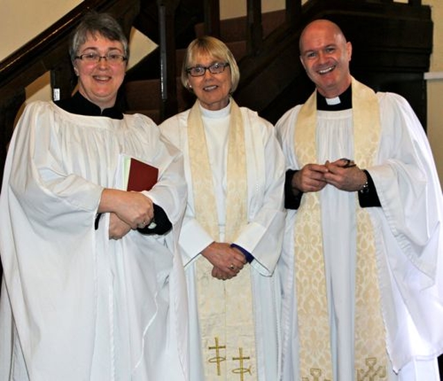 Dr Anne Lodge, student at CITI; the Bishop of Meath and Kildare, the Most Revd Pat Storey; and the Vicar of St Ann’s, Dawson Street, the Revd David Gillespie following the service on Sunday March 2 at which funds raised by the Black Santa Sit Out 2013 were distributed to charities. 
