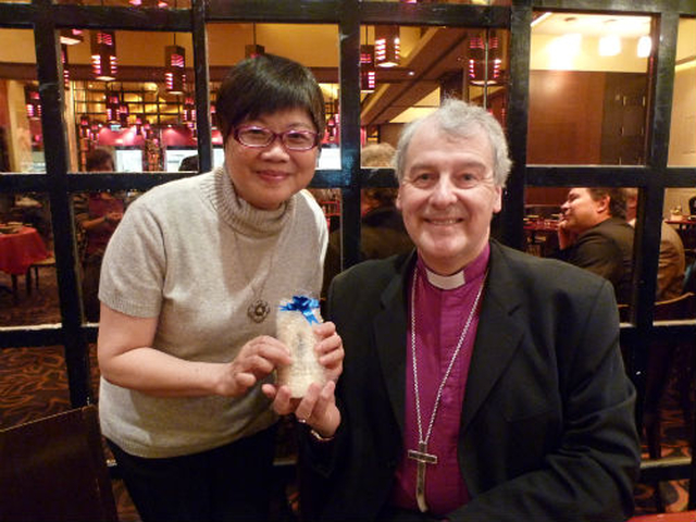 Archbishop Michael Jackson pictured with Ms Isabella Luk of St Paul’s Church Council in Hong Kong.