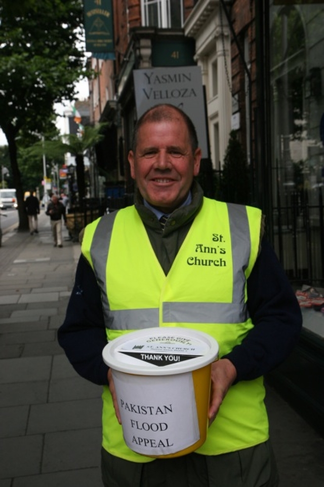 Fred Deane collecting in aid of the Pakistan Flood Appeal on Dawson Street.
