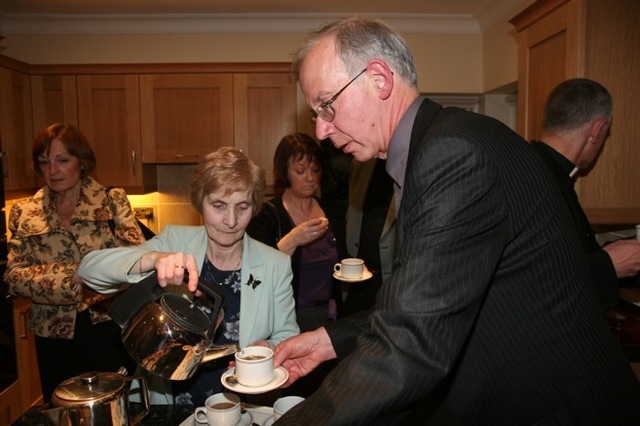 Having his first cuppa in the newly blessed and dedicated Rectory in Howth, the Revd Kevin Brew with vestry member Eileen Rowden.