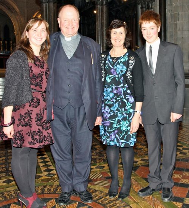 Canon William Deverell with his wife Valerie, daughter Amy and son Lionel following the service in which he was installed as a canon of Christ Church Cathedral on December 8. 