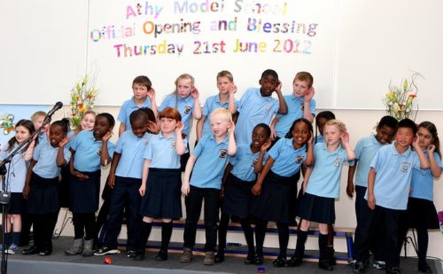 First and second pupils singing at the official opening of Athy Model School. 