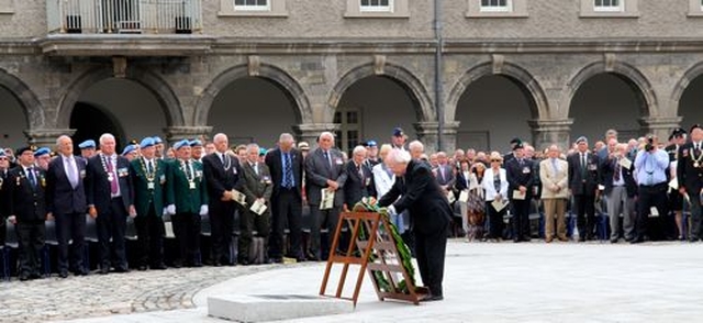 President Michael D Higgins lays the wreath during the ceremony to mark the National Day of Commemoration in the Royal Hospital Kilmainham today, July 14.