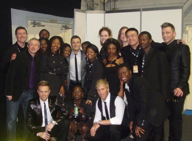 The Discovery Gospel Choir with Westlife and Louis Walsh at the Meteor Music Awards.