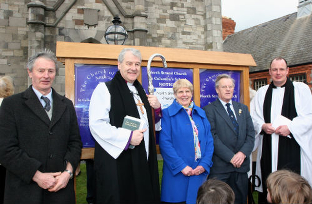 Leslie Blackwell; the Archbishop of Dublin, the Most Revd Dr Michael Jackson; Olive Cooper, church warden and wife of the late Cecil Cooper; North Strand rector, Revd Roy Byrne; and church warden Mervyn Denner at the dedication of a new noticeboard for North Strand Church and St Columba’s School. The noticeboard was erected in memory of Cecil Cooper and made by Leslie Blackwell.