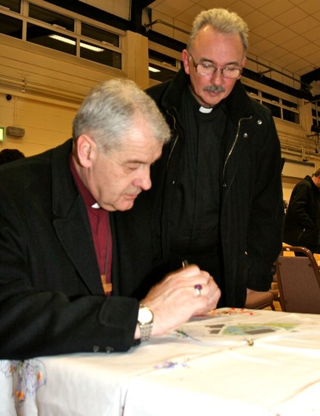 Archbishop Michael Jackson signs his name to add to the collection of signatures of clergy who have visited St Brigid’s Church in Stillorgan. They include the signature of Archbishop William Conyngham Plunket who was Archbishop of Dublin from 1884 to 1897. 