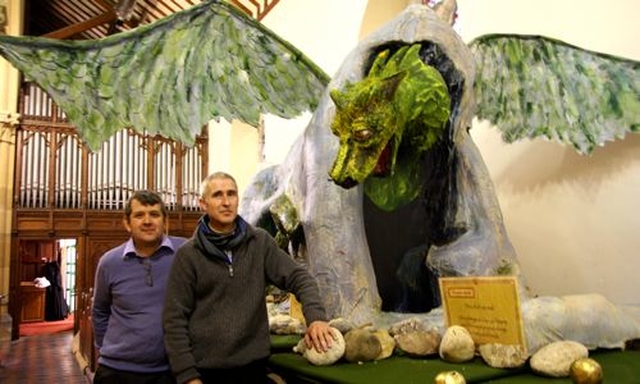 Alan Murphy and David Salmon (creative director) with the dragon which forms part of the Narnia Festival which opened in Christ Church Bray on Ash Wednesday and continues until Easter Sunday. 