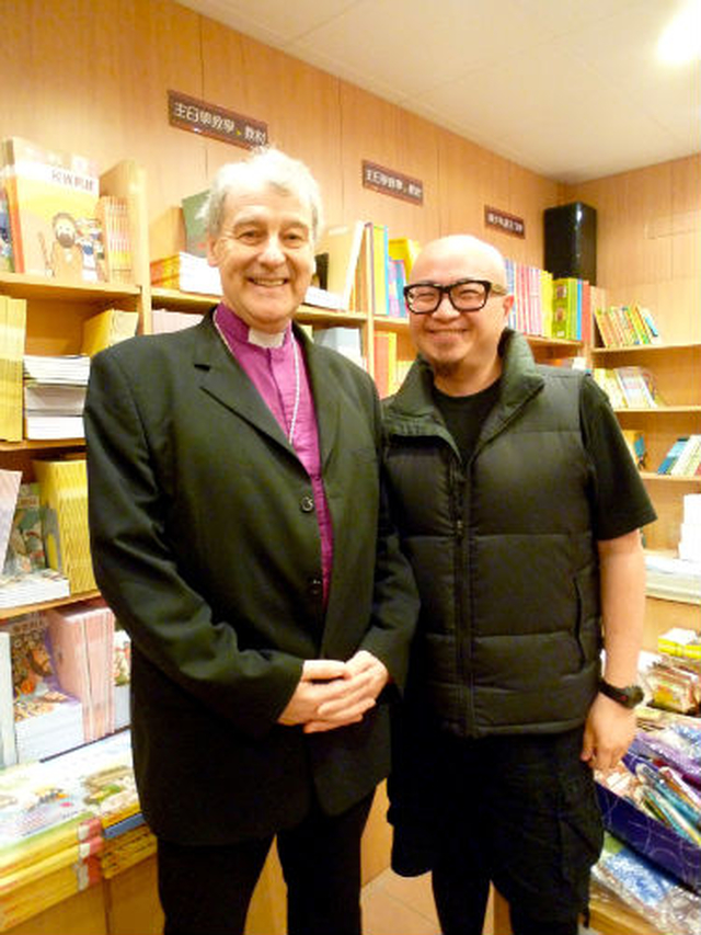 The Archbishop pictured with Mr Jason Wu, award winning designer of the Christian Resources used throughout the Province of Hong Kong.