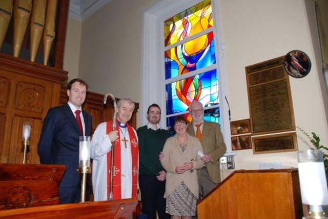 Joan Forsdyke, the stained glass artist, with husband Tom & sons, Jonathan & Mark at the dedication of the new stained glass in Rathfarnham parish church.