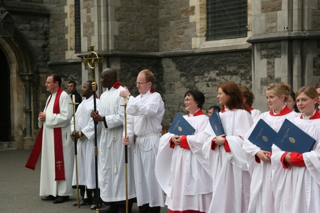 Candlebearers and the crucifer with the Revd Roy Byrne and the Christ Church Cathedral Choir following the ordination of the Revd Robert Lawson, the Revd Anne-Marie O'Farrell and the Revd Stephen Farrell to the priesthood in Christ Church Cathedral.