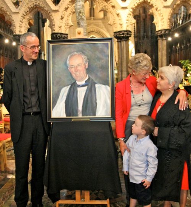 A portrait of former Dean of Christ Church Cathedral, the Very Revd Desmond Harmon, was unveiled this afternoon. Pictured are the current Dean, the Very Revd Dermot Dunne, Sue Harmon and her grandson, and artist Olivia Bartlett. 