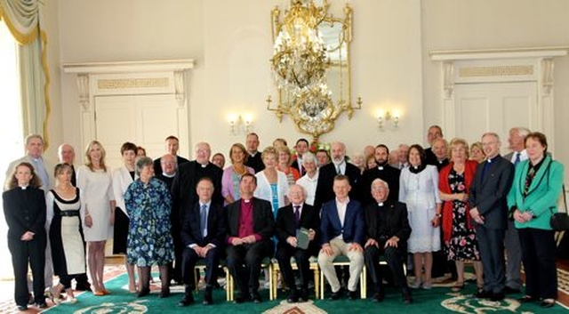 President Michael D Higgins with members and friends of Cumann Gaelach na hEaglaise during their visit to Áras and Uachtaráin to mark the 100th anniversary of the Irish Guild of the Church of Ireland. 