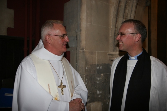 The Archbishop of Dubin, the Most Revd Dr John Neill (left) congratulating the Revd Dr Maurice Elliott on his commissioning as Director of the Church of Ireland Theological Institute.