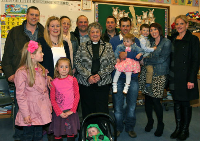 The new rector of the grouped parishes of Donoughmore and Donard with Dunlavin, Revd Olive Henderson (centre) with of her children, their partners and some of her 16 grandchildren following her institution at St Nicholas’ Church, Dunlavin. 