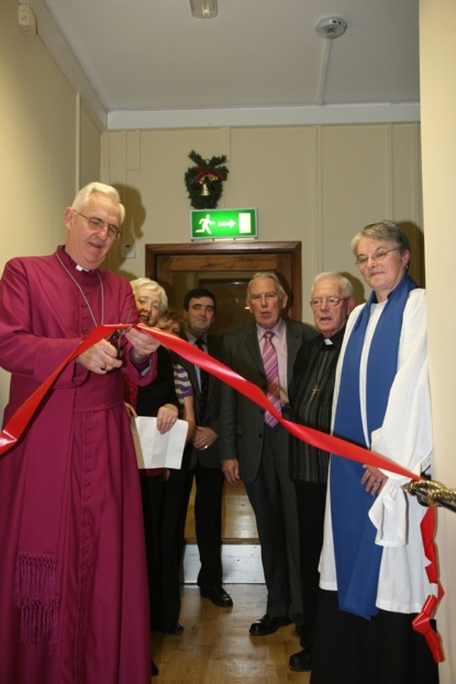 The Archbishop of Dublin officially opens a new wing at St John's House. With him (from left) are Aileen Egan (Matron), Catherine Martin, Activity Carer, Bryan Burdett, Sheltered Housing Manager, Ivor Moloney, Chairman, Fr Sean Hynes, Roman Catholic Chaplain, and Joan Kirk, Lay Church of Ireland Chaplain.