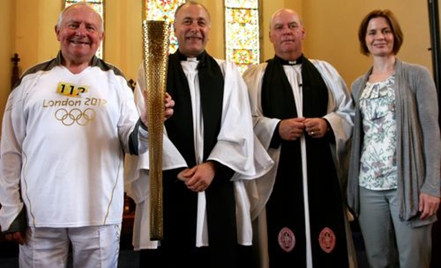 Olympic torch bearer, Derek Williams; rector of Blessington, Revd Leonard Ruddock; Archdeacon of Glendalough, the Ven Ricky Rountree; and GOAL development and education coordinator, Maeve Seery, following the West Glendalough Children’s Choral Festival in St Mary’s Church in Blessington. 