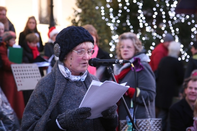 Alice Leahy of Trust reading at community carols at the Mansion House oraganised by the Diocesan Council for Mission and the RC Archdiocese of Dublin Year of Evangelization.