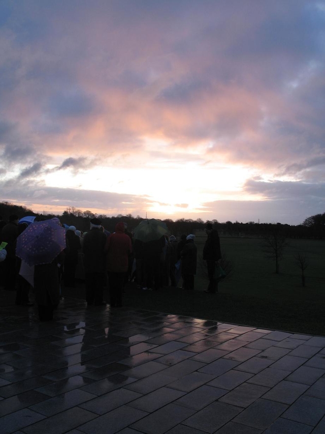 Worshippers from Castleknock at the Ecumenical Easter ‘Sonrise’ service at the Papal Cross in the Phoenix Park watch the Easter Dawn on Easter morning.