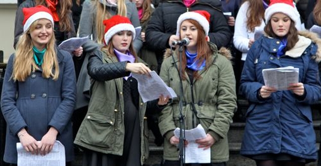 Members of the choir, Teen–Spirit, performing on the steps of the Mansion House yesterday (Saturday December 14) at the annual ecumenical carol singing organised by the Dublin and Glendalough Council for Mission and the Office of Evangelisation and Ecumenism of the Archdiocese of Dublin. 