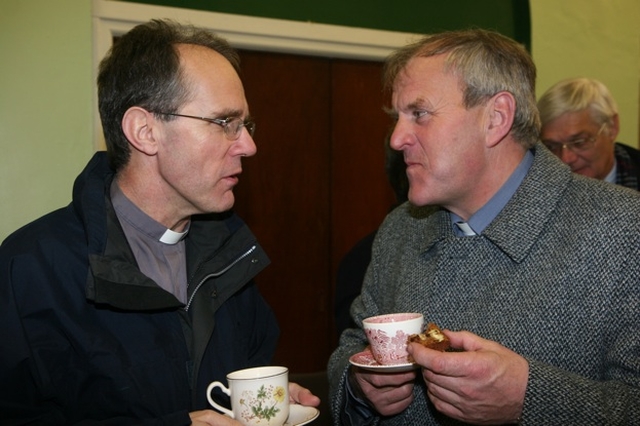 Chatting at the reception following the institution of the Revd Canon John McCullagh as Rector of Rathdrum and Deralossary with Glenealy are (left) the Revd Canon Ian Ellis, General Synod Board of Education, Northern Ireland and the Revd William Bennett, Rector of Newcastle, Diocese of Glendalough.