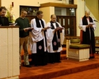 Fr Binoy Matthew, the Rev Ivor Owen, the Revd Michael Anderson, Canon Nigel Sherwood, Canon George Butler, Archbishop Michael Jackson and Canon John Piert deliver the blessing at the end of the service in St Joseph’s Church, Templerainey, Arklow at which the Archbishop preached to mark the Week of Prayer for Christian Unity.  