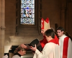 The Archbishop of Dublin and Bishop of Glendalough, the Most Revd Dr John Neill laying hands on the Revd Terry Alcock at her ordination to the Diaconate in Christ Church Cathedral.