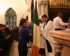 Presentation of the colours to the Revd Derek Sargent, Diocesan Chaplain of the Boys Brigade and the Revd Gillian Wharton, Rector of Booterstown and Mount Merrion at the Boys Brigade Council Service of Thanksgiving in Booterstown, Dublin.