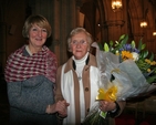 Celia Dunne presenting Betty Neill with flowers at a special presentation ceremony in Christ Church Cathedral following the Eucharist to mark the retirement of Archbishop Neill. 