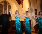 The three Sopranos Wendy Dwyer, Kay Lynch and Deirdre Masterson with their Pianist David Rea taking a bow at the conclusion of their concert in Christ Church, Delgany in aid of Delgany National School.