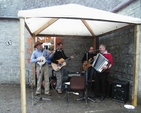 Spencer Hawkins, Jimmy Sunderland, David Hendy & Dermot Finley performing at the Castledermot BBQ and afternoon tea event.