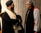 Archbishop Michael Jackson talks to the Revd Fr Athanasius George of the Coptic Orthodox Church before the inaugural service for the Week of Prayer for Christian Unity in St Fintan’s Church, Sutton. 