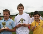 Displaying their winners trophies at the West Glendalough schools sports day in Donaghmore, Co Wicklow.