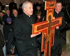 The Church of Ireland and Roman Catholic Archbishops of Dublin, Michael Jackson and Diarmuid Martin, arrive at the Pro Cathedral at the end of the Ecumenical Procession of the Cross which started at Christ Church Cathedral on Good Friday. 