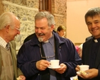 Fr Enda Lloyd, Parish Priest of Greystones (centre) and Fr Liam Belton, Parish Priest of Kilquade (right) enjoying the reception following the Delgany parish Harvest Service.