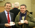 Pictured are Robin George of Protestant Aid (left) and the new Diocesan Secretary, Scott Hayes at the presentation of cheques to various charities from the proceeds of the 2009-2010 Black Santa Collections outside St Ann's Church.