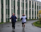 Ordinands from the Church of Ireland Theological Institute, Jason Kernohan and Peter Ferguson finishing their run and cycle for Charity at the Institute.