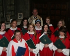 Members of the Christ Church Cathedral Girls Choir presented with awards by RSCM (Royal School of Church Music) in Christ Church Cathedral recently. Also pictured (back) is the Dean of Christ Church, the Very Revd Dermot Dunne and (front) Director of Music, Judy Martin.