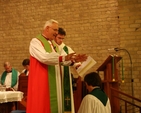 The Archbishop of Dublin, the Most Revd Dr John Neill blessing the Revd Adrienne Galligan at her institution as Rector of Crumlin and Chapelizod.