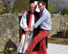 Bishop Ferran Glenfield and his son Richie planting a tree to mark the 150th anniversary of Kill O’ the Grange church. (Photo: James Darling)