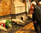 President Michael D Higgins and the President of the Royal British Legion in Ireland, Major General The O’Morchoe lay wreaths at the War Memorial in the north transept of St Patrick’s Cathedral during the service on Remembrance Sunday. 